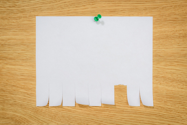 top view of empty paper for ads with drawing pin on wooden board  - Photo, Image
