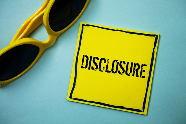 Writing note showing  Disclosure. Business photo showcasing The action of making New or Secret Confidential information known Ideas messages blue background sunglasses casual annotations thoughts - Photo, Image