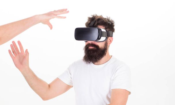 Man with beard fighting while wearing VR glasses. Hipster with long beard testing new gadget on white background. Bearded man enjoying 3D experience, watching 360 video, top-notch techlogies concept - Foto, immagini