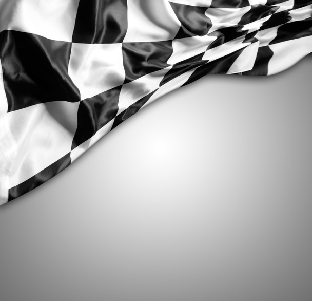 Καρό σημαία μαύρο και άσπρο σε γκρι φόντο. Χώρο αντίγραφο - Φωτογραφία, εικόνα