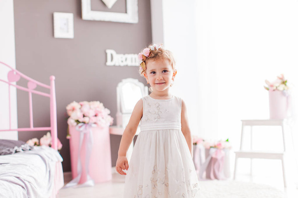 Admirable toddler girl in her fashionable room - Fotografie, Obrázek