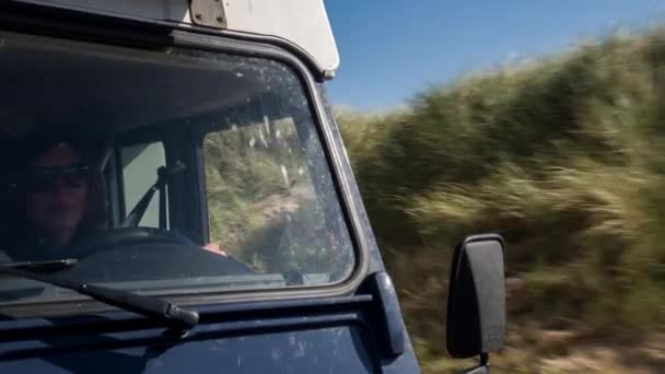 a camera attached to the front of a campervan focusing on the driver - Footage, Video