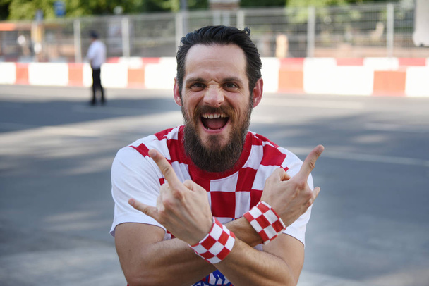 25 June 2018. Rostov-on-Don. Russia. Croatian man football fan supports the national team of Croatia at the World Cup. Before the game in Sochi. - Фото, зображення