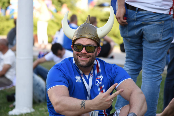 June 25, 2018. Rostov-on-Don. Russia. Icelandic football fans in Viking helmets support Iceland's national team at the FIFA World Cup. - Фото, зображення