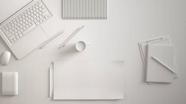White monochrome minimal office table desk. Workspace with laptop, notebook, pencils and coffee cup. Flat lay, top view, blank paper mockup template - 写真・画像