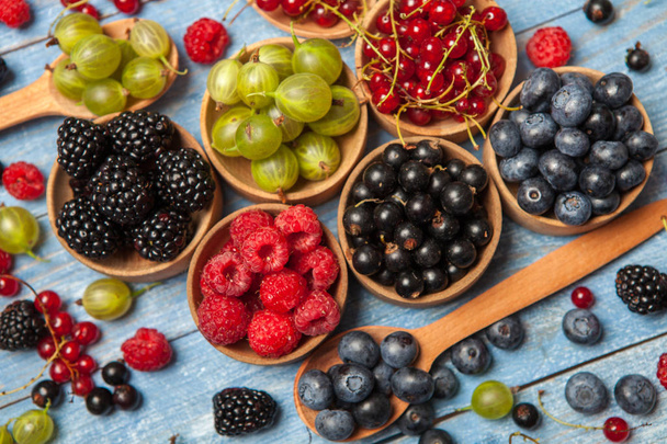 Various fresh summer berries. Top view. Berries mix fruit color food dessertBerries.Antioxidants, detox diet, organic fruits. - Photo, Image