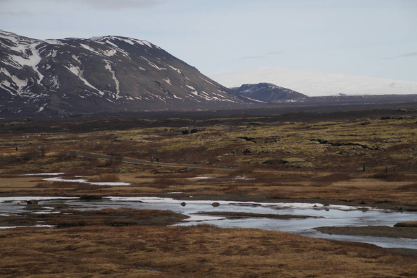 Εθνικό Πάρκο (Thingvellir) στην Ισλανδία. ingvellir ή (Thingvellir) εθνικό πάρκο στην Ισλανδία, είναι ένα site των ιστορικών, πολιτιστικών, και γεωλογική σημασία. Η σχισμή του Silfra μεταξύ της Βόρειας Αμερικής και της Ευρασίας ηπειρωτικές πλάκες που βρίσκεται εδώ. - Φωτογραφία, εικόνα