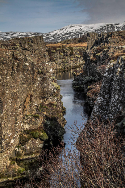 Thingvellir National Park in Iceland. ingvellir or Thingvellir national park in Iceland, is a site of historical, cultural, and geological significance. The Silfra fissure between the North American and Eurasian continental plates located here. - Foto, afbeelding