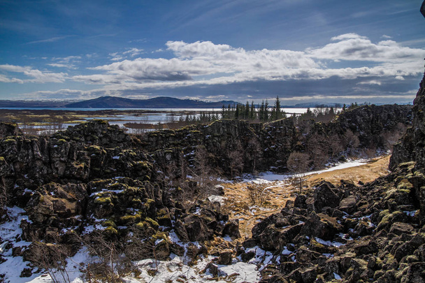 Thingvellir National Park in Iceland. ingvellir or Thingvellir national park in Iceland, is a site of historical, cultural, and geological significance. The Silfra fissure between the North American and Eurasian continental plates located here. - Photo, Image
