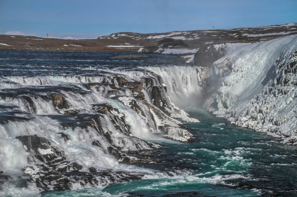 グトルフォスの滝ビューと冬風景画像冬の季節に。グトルフォスはアイスランドの Hvita 川の峡谷にアイスランド、観光名所で最も人気のある滝の一つ. - 写真・画像