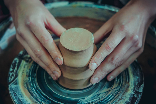 Creating ceramic products of white clay close-up. - Photo, Image