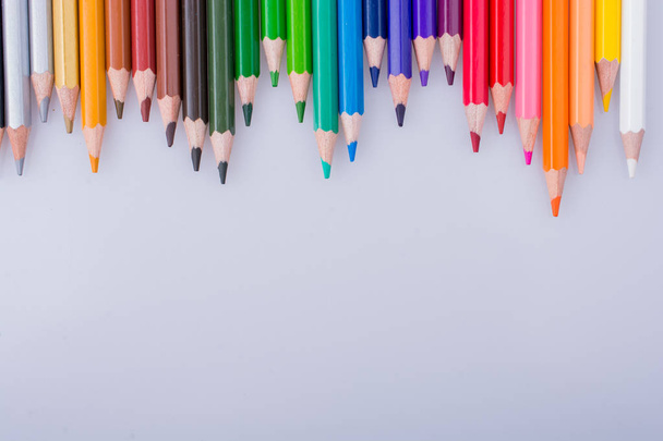 Color Pencils of Various colors placed on white background - Photo, Image