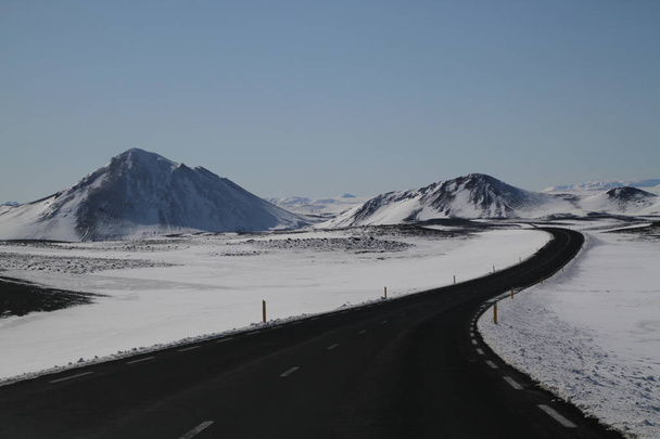 Road in Iceland. Landscape and road in winter, road trip on the country at Iceland. Beautifull nature of Iceland. Epic and majestic landsacapes. Route Number One (Ring Road). - Valokuva, kuva
