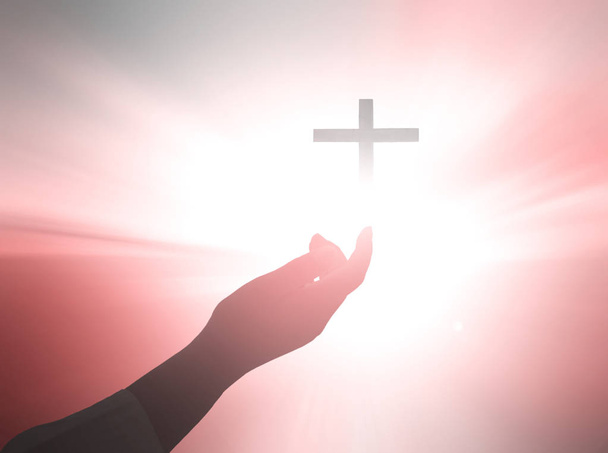 Silueta křesťanských modliteb zvedá ruku, zatímco se modlí k Ježíši - Fotografie, Obrázek