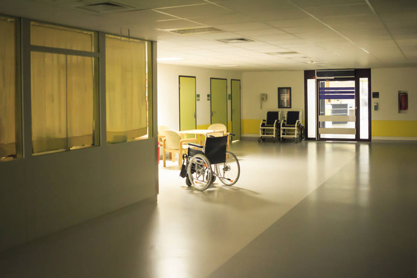 View of empty wheelchair in hospital corridor - Fotografie, Obrázek