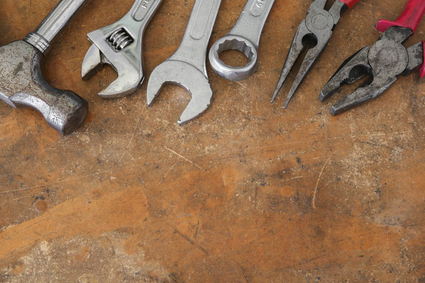 different tools on rustic wooden worktop, copy space background - Φωτογραφία, εικόνα
