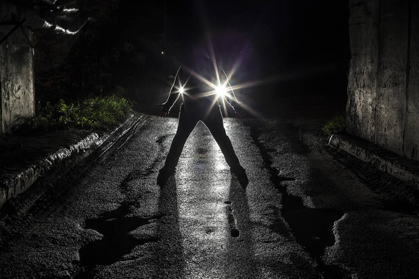 silhouette of man standing alone. night scene.  - Foto, Imagem