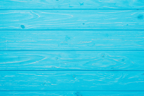 felülnézet, a háttér világos kék fa deszka felülete - Fotó, kép