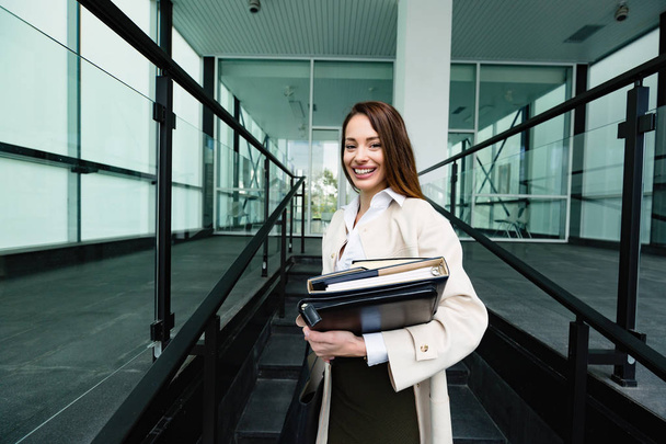 Portrait of young attractive businesswoman going to office - Fotoğraf, Görsel