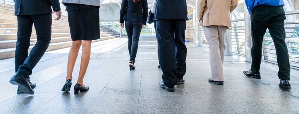 legs of business people walking in the modern city. - Photo, Image