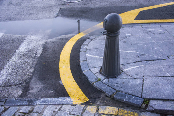 Photo of a bollard with cold colours and sunlight - Photo, Image