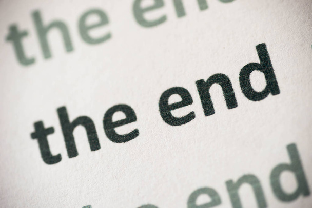 word the end printed on white paper macro - Photo, Image
