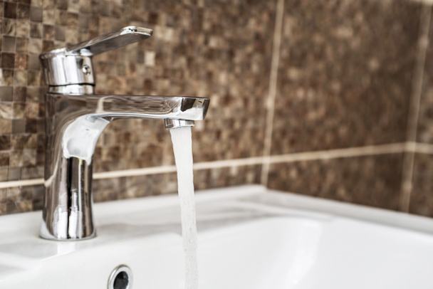 Open water tap with running water - Photo, Image