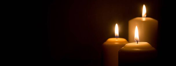 Ritual candle on a black background. - Foto, Imagem