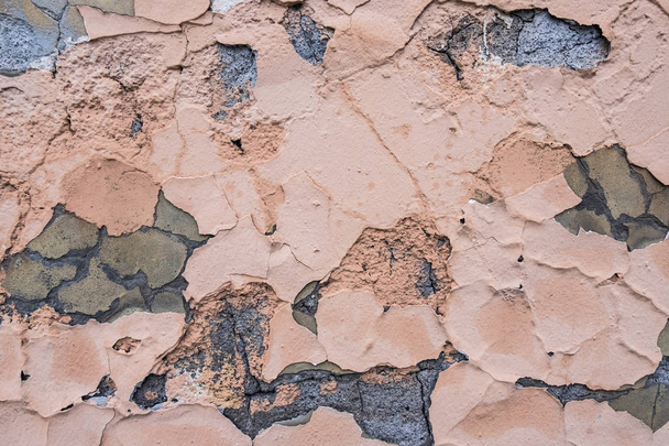 Decayed salmon concrete wall. - Fotó, kép