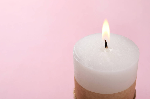 Burning wax candle on color background, closeup - Foto, Imagen