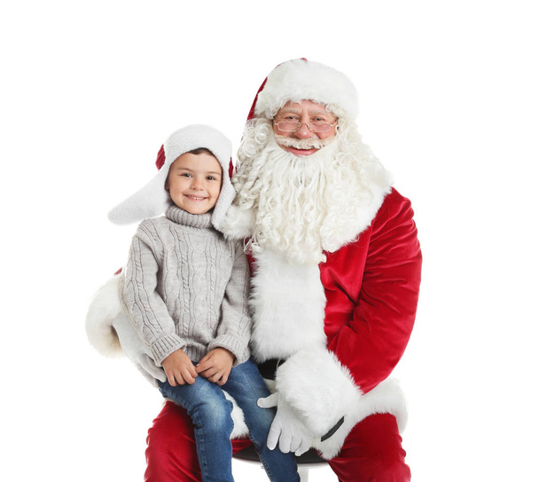 Little boy and authentic Santa Claus on white background - Фото, зображення