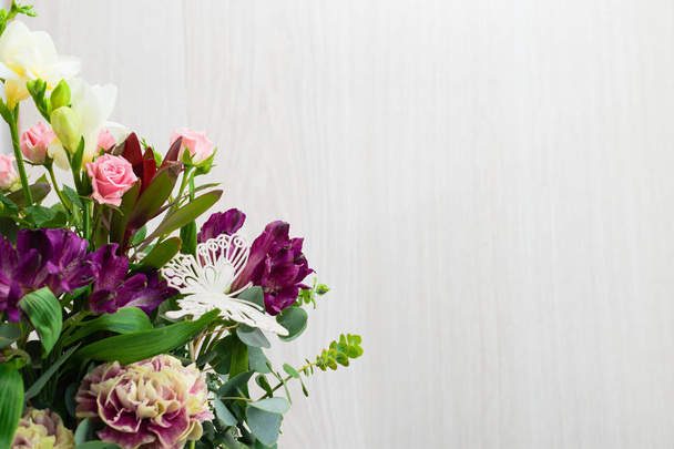 close-up bouquet of flowers in paper bag - Φωτογραφία, εικόνα