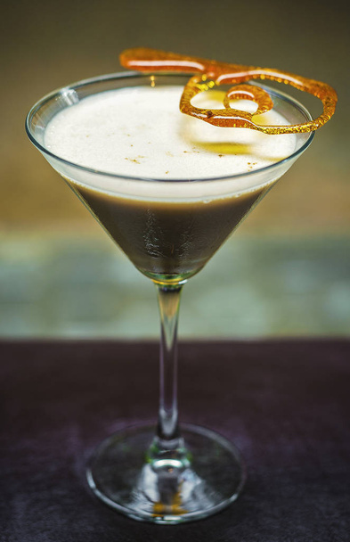 creme caramel cream martini cocktail drink glass  on bar - Photo, image