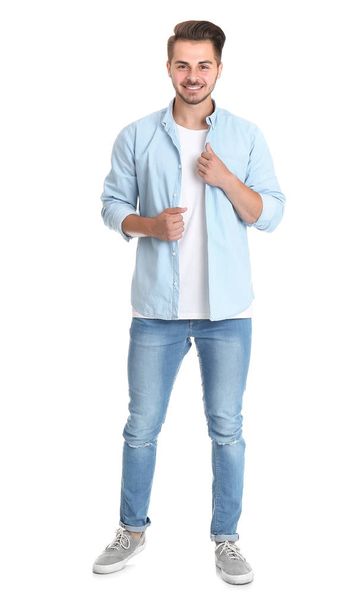 Young man in stylish jeans on white background - Foto, Imagem