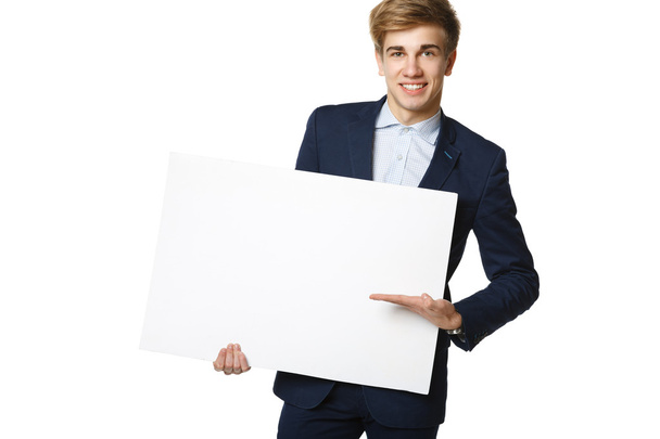 man in suit holding blank whiteboard - Fotoğraf, Görsel