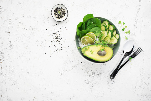 Vegetarian vegetable summer avocado micro-greenery bowl. Top View. - Photo, image