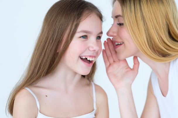 mom kid communication mother sharing secret - Foto, immagini