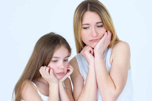 sad pensive mother daughter waiting missing family - Photo, image