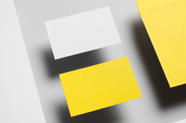Branding / Stationery Mock-Up - Yellow & White. Close-Up. Floating - Letterhead (A4), DL Envelope, Business Cards (85x55mm) - Foto, afbeelding