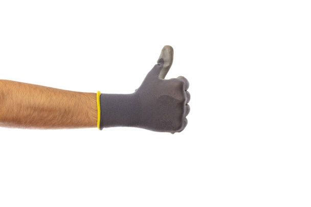 Thumb up gesture or hand counting one, gloved hand,  isolated on white background, clipping path - Φωτογραφία, εικόνα