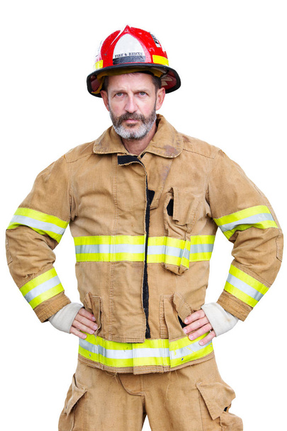 portrait of handsome fireman in uniform with white background - Zdjęcie, obraz