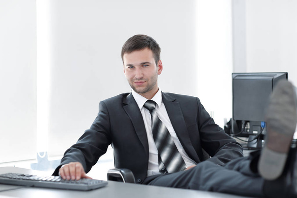 confident businessman sitting at Desk in a private office - 写真・画像