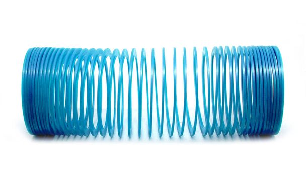 Синяя игрушка-слинг Изолированная на белом фоне
 - Фото, изображение