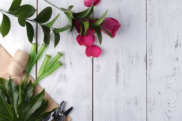 Florist background on white wooden table with copy space - Φωτογραφία, εικόνα