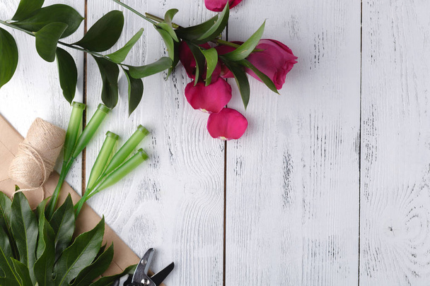 Floral background on white wooden table, make flowers decoration - Foto, Bild