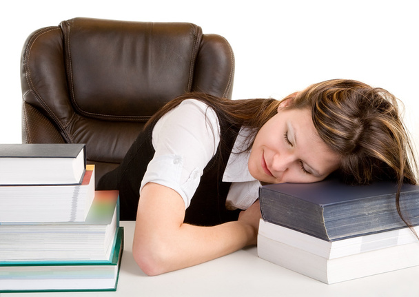 εξαντληθεί φοιτητής κοιμάται στα βιβλία της - Φωτογραφία, εικόνα