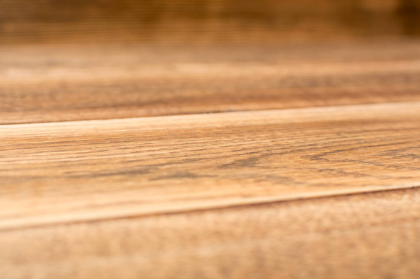 Прекрасний вінтажний коричневий дерев'яний фон. Стару пофарбовану дерев'яну поверхню столу. Рустикальна світла кольорова дошка столу або текстура дошки з копійкою для монітора продукту
 - Фото, зображення