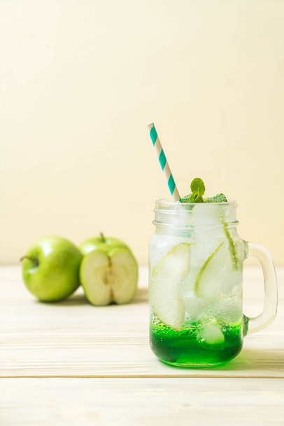 green apple soda on wood table - Fotoğraf, Görsel