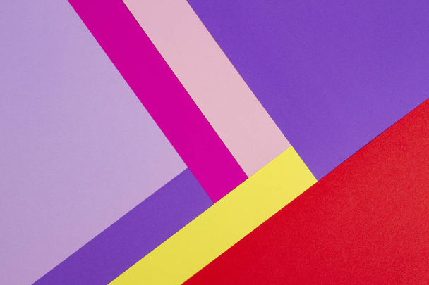 Color papers geometry flat composition background with violet, purple, pink, rose, red, yellow tones. - Fotografie, Obrázek