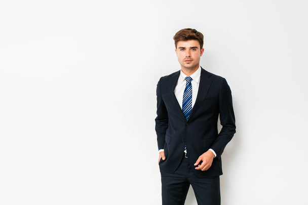 elegant man in suit, office outfit, standing on white background - Foto, Imagem